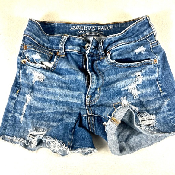 American Eagle Outfitters Pants - American Eagle Hi-Rise Shortie Distressed Denim Shorts Blue Super Stretch Size 2